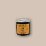 Savon rond artisanal parfum oud 100g, présenté en pain.