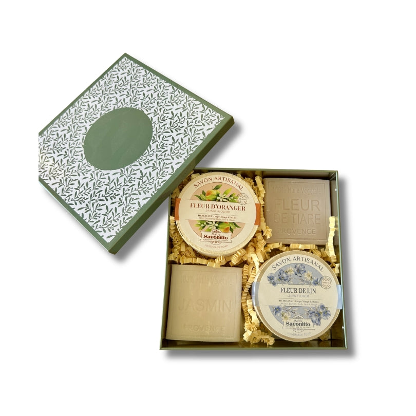 Coffret Senteurs Florales composé de 4 savons, présenté dans une boîte en métal.