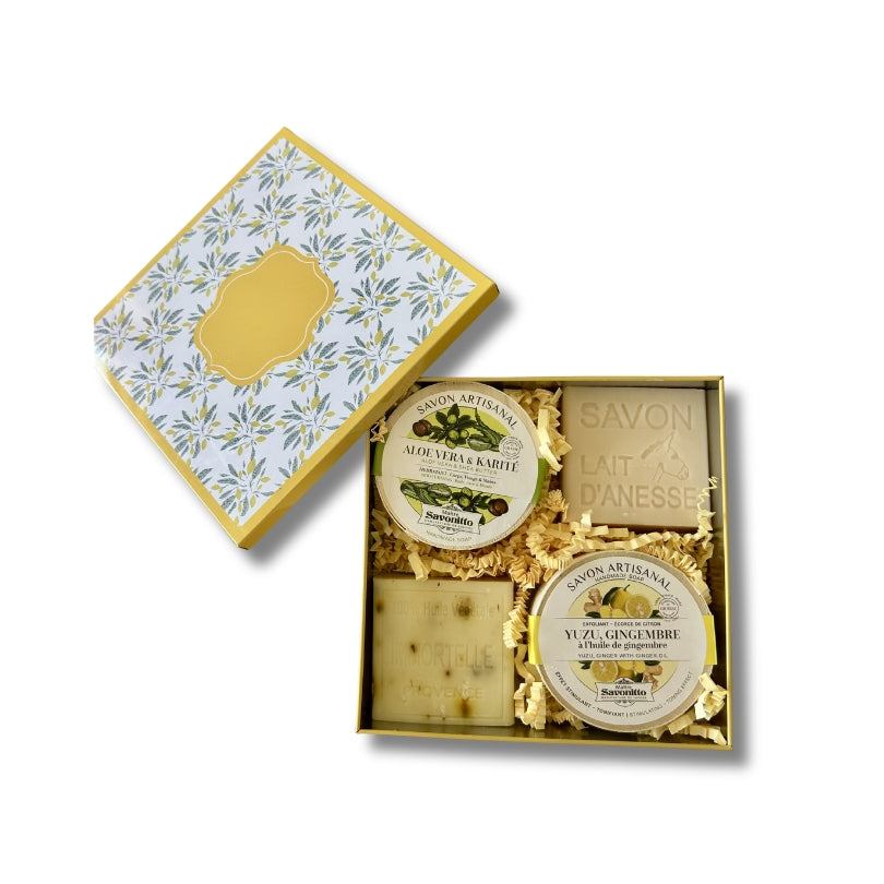 Coffret Bienfaits composé de 4 savons, présenté dans une boîte en métal.