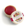 Savon au parfum de fruit de la passion présenté dans une boîte en bois.