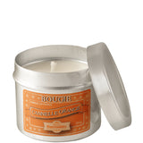 Bougie artisanale parfum cannelle et orange 100g, présentée dans un contenant décoratif.