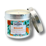 Bougie artisanale parfum fleur d’oranger, présentée dans un contenant décoratif
